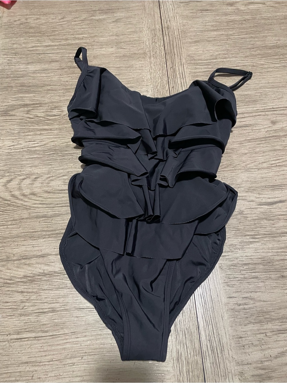Black ruffled one piece bathing suit